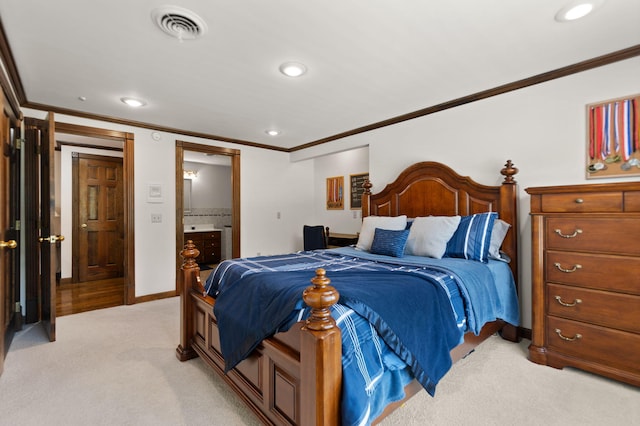 bedroom with recessed lighting, light colored carpet, visible vents, ensuite bathroom, and ornamental molding