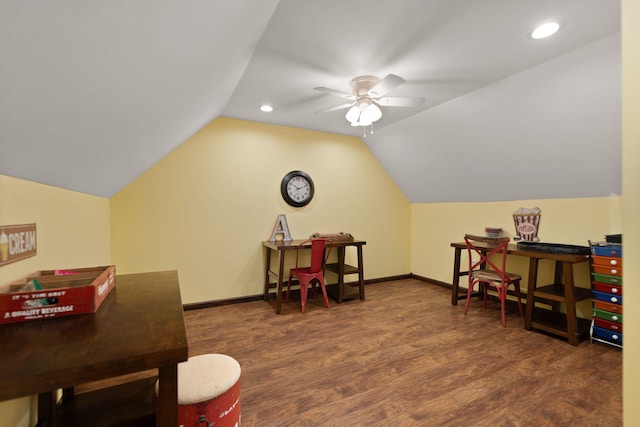 rec room with ceiling fan, dark hardwood / wood-style floors, and vaulted ceiling