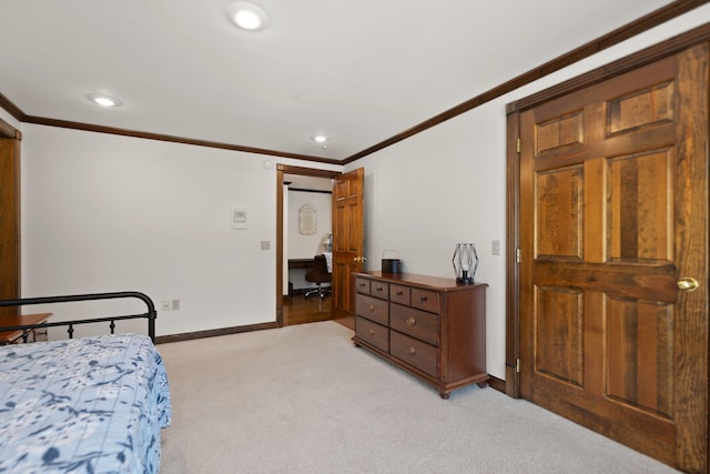 carpeted bedroom featuring crown molding