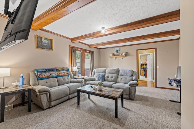 living room featuring carpet floors, a textured ceiling, and beam ceiling