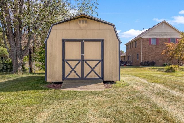 view of outdoor structure featuring a yard