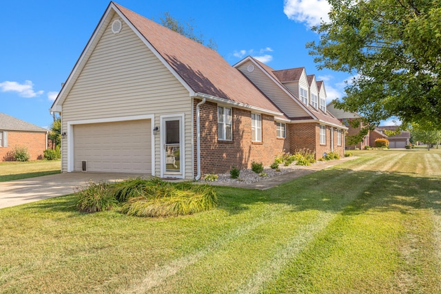 view of side of property with a lawn