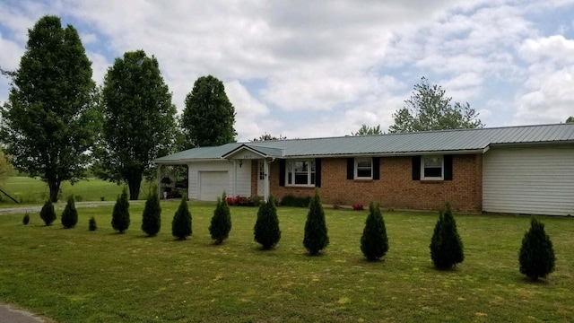 ranch-style house with a front lawn and a garage