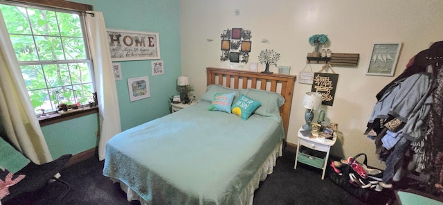 bedroom featuring carpet