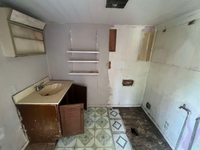 bathroom with sink and tile patterned floors