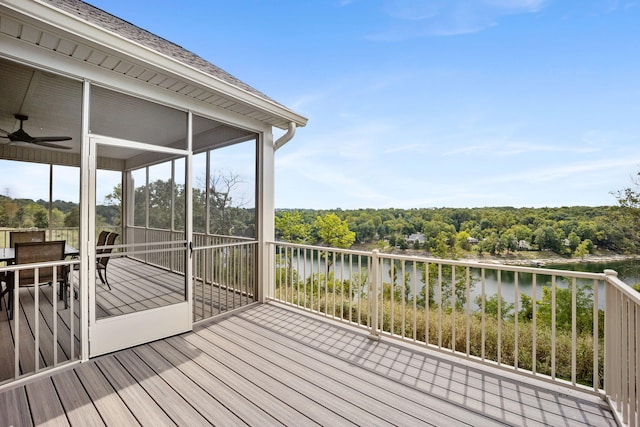 1830 Hunter Dr, Lancaster, KY 40444 - deck featuring a water view, ceiling fan, outdoor dining space, a sunroom, and view of wooded area
