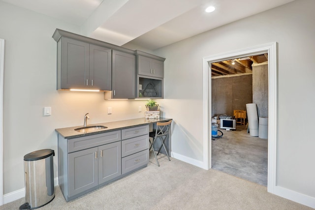 1830 Hunter Dr, Lancaster, KY 40444 - kitchen with gray cabinetry, a sink, baseboards, light carpet, and recessed lighting
