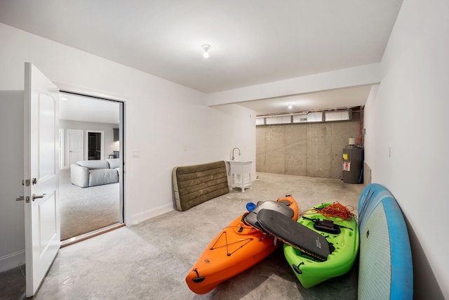 1830 Hunter Dr, Lancaster, KY 40444 - game room featuring water heater and concrete flooring