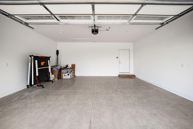 1830 Hunter Dr, Lancaster, KY 40444 - garage with baseboards and a garage door opener