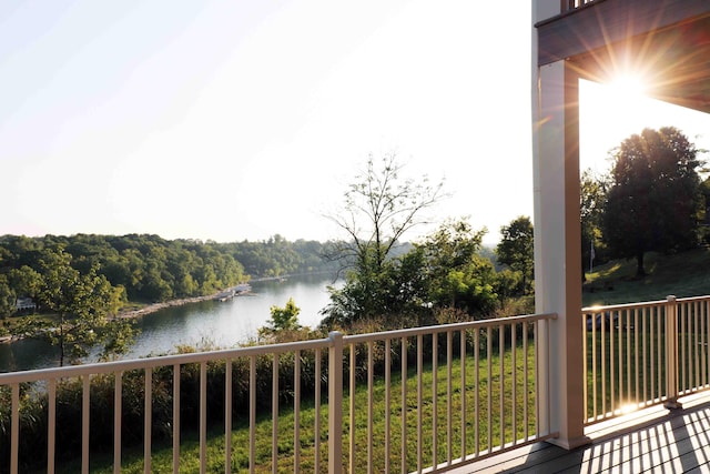 balcony featuring a water view