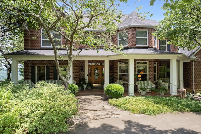 view of front of home featuring covered porch