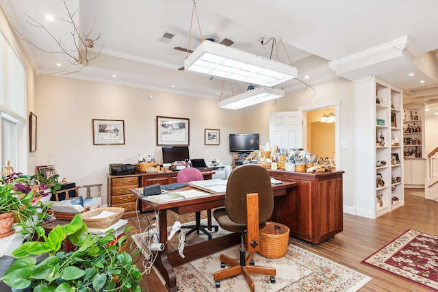 office space featuring ornamental molding and hardwood / wood-style flooring