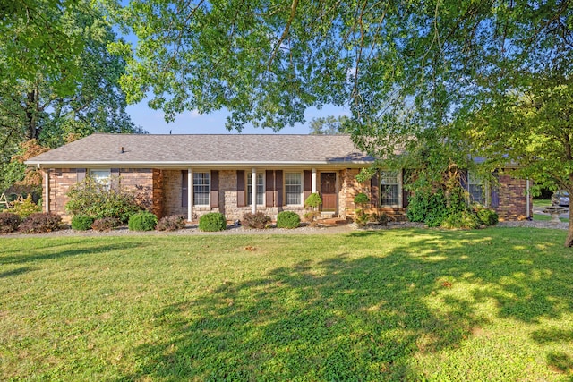 ranch-style house with a front yard