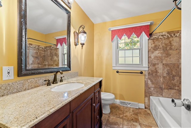 full bathroom with bathtub / shower combination, vanity, and toilet