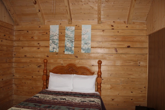 unfurnished bedroom with wood ceiling, wooden walls, and lofted ceiling with beams