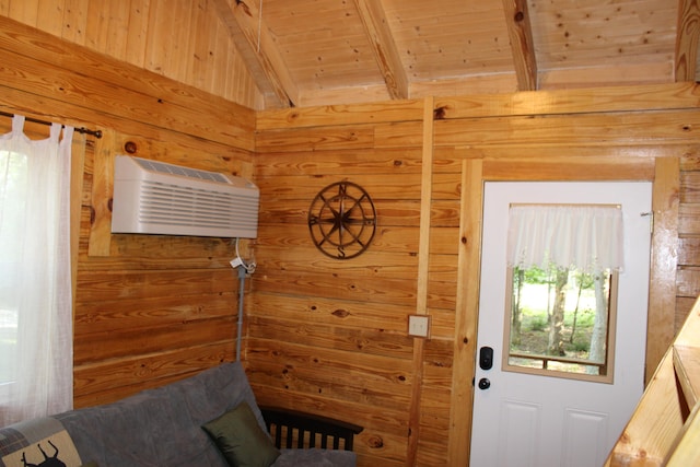 entryway with wooden ceiling, lofted ceiling with beams, and wood walls