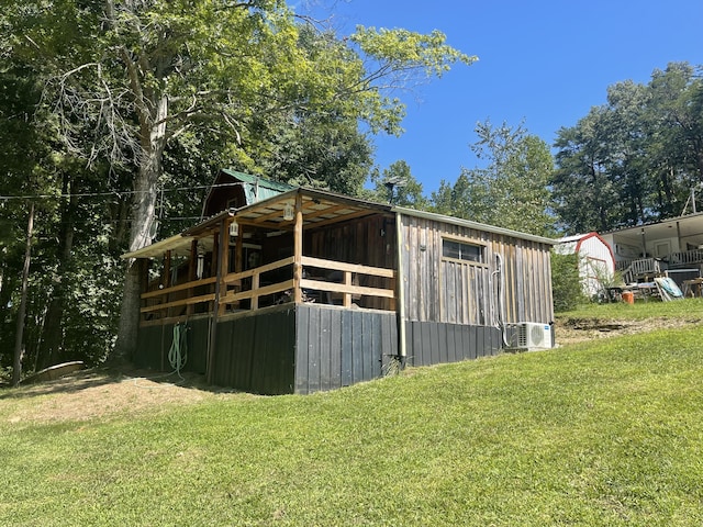 view of outbuilding with an outdoor structure