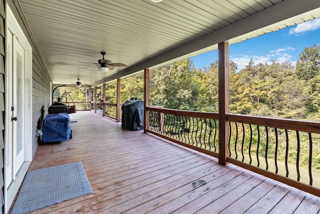 deck featuring grilling area and ceiling fan