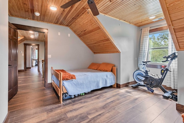 bedroom featuring lofted ceiling, dark hardwood / wood-style floors, and wooden ceiling