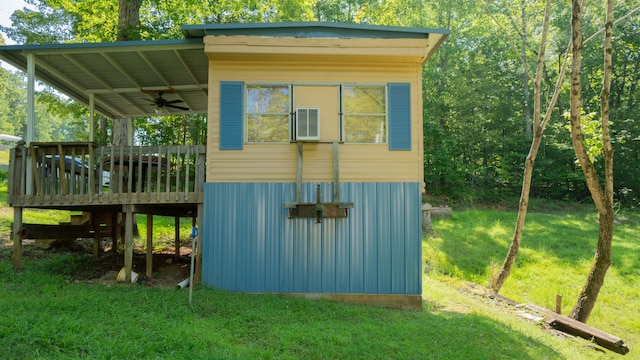 view of outbuilding with a lawn