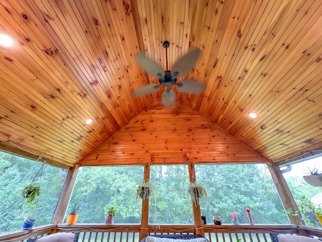 exterior details with wood ceiling and ceiling fan