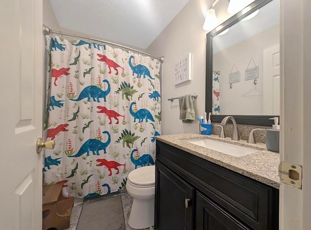 bathroom featuring tile patterned flooring, vanity, toilet, and a shower with curtain