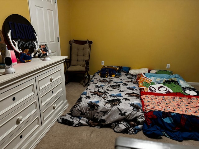 bedroom featuring carpet