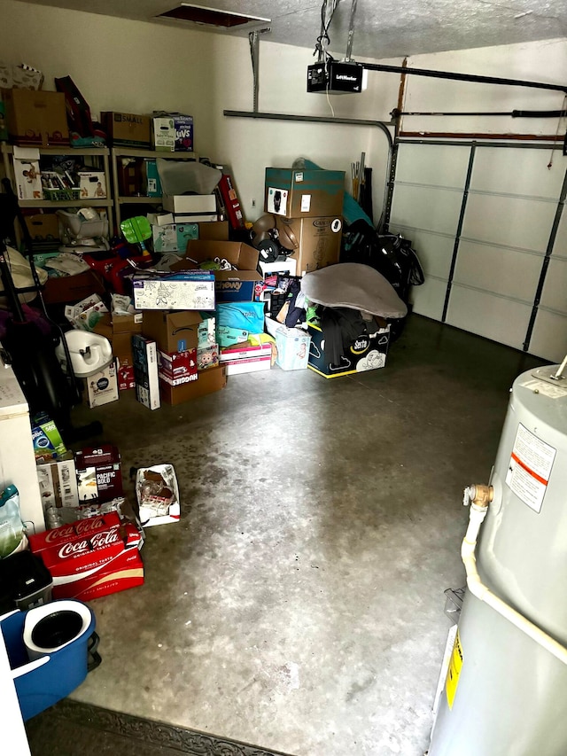 garage with a garage door opener and water heater