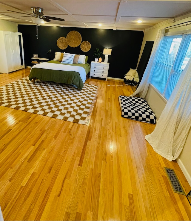 bedroom featuring light hardwood / wood-style flooring and ceiling fan