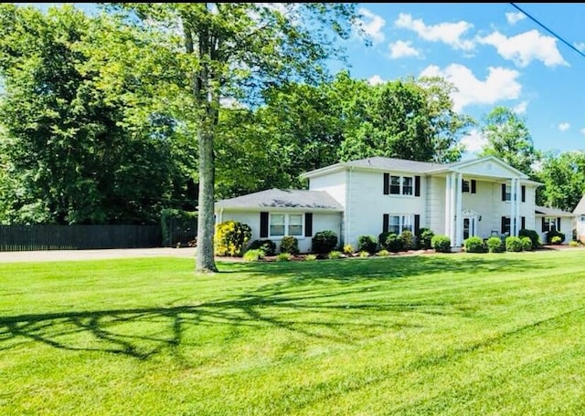 view of front of house with a front yard