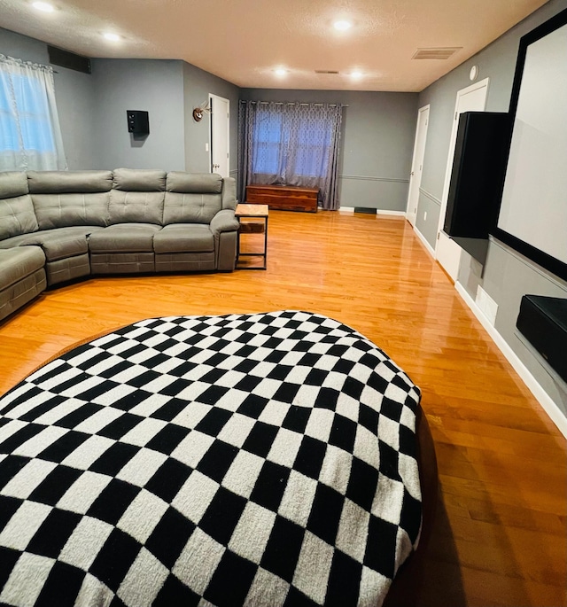 unfurnished living room with light wood-type flooring