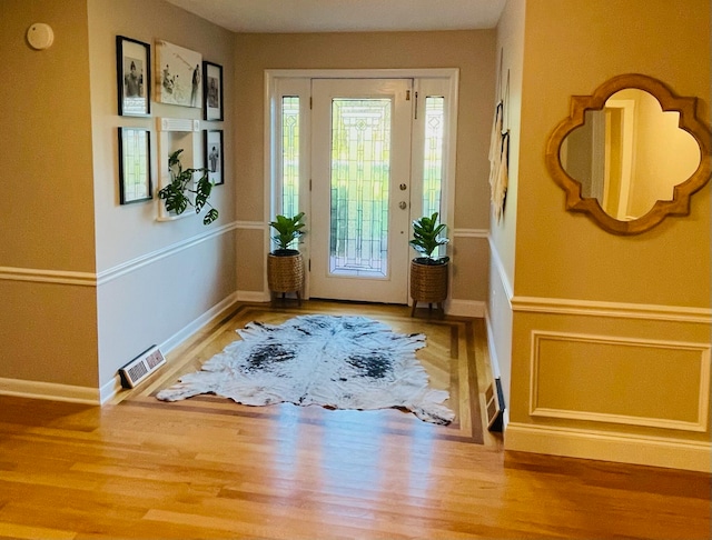 entrance foyer with hardwood / wood-style flooring