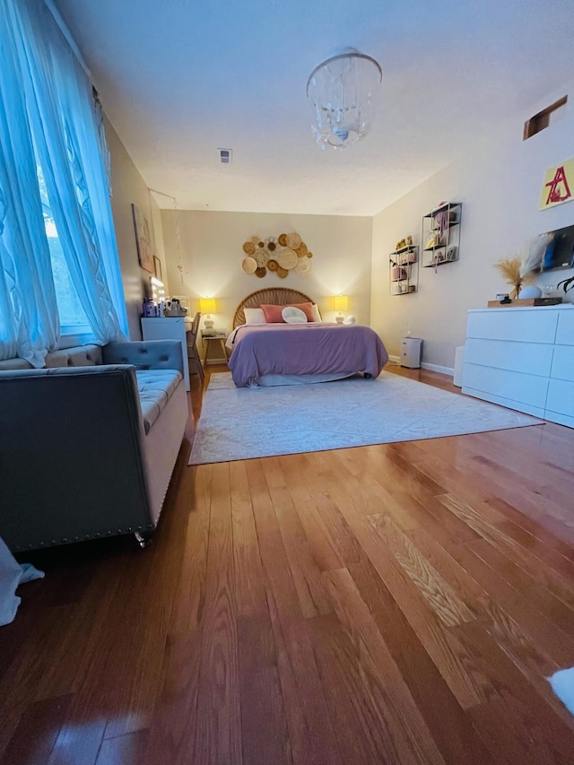 bedroom featuring dark hardwood / wood-style floors