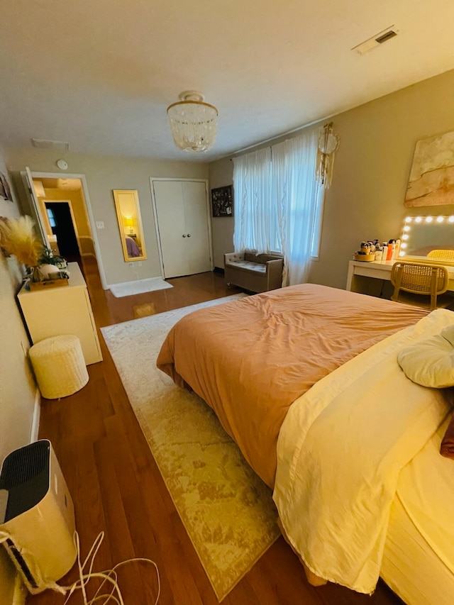 bedroom featuring hardwood / wood-style flooring