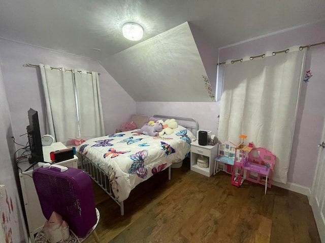 bedroom featuring wood-type flooring and vaulted ceiling