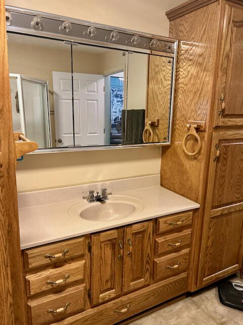 bathroom featuring vanity and tile patterned floors