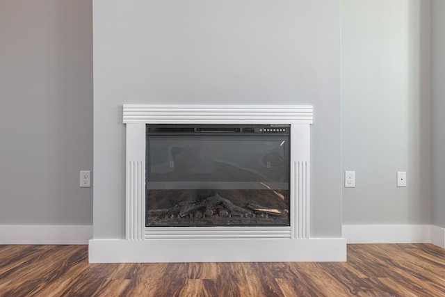 interior details featuring wood-type flooring