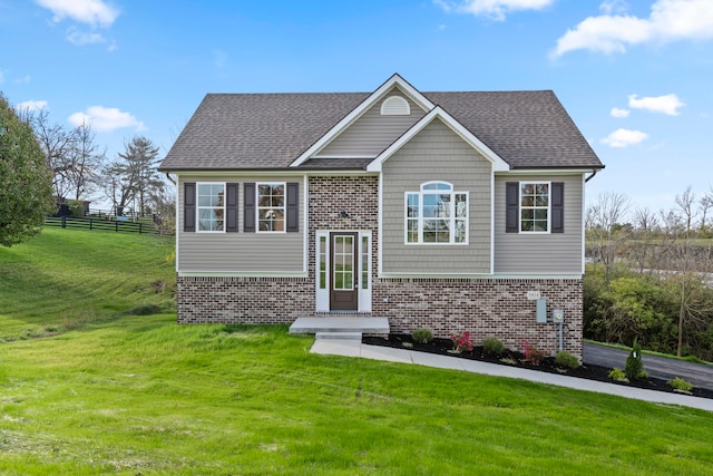 view of front of home featuring a front yard