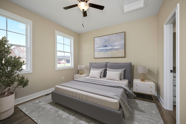 bedroom featuring dark hardwood / wood-style floors and ceiling fan