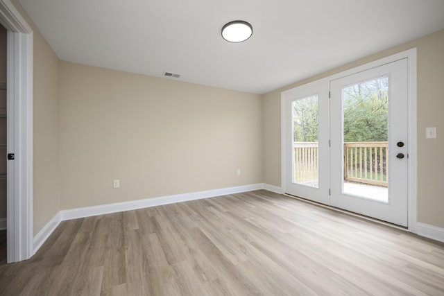 empty room featuring light hardwood / wood-style flooring