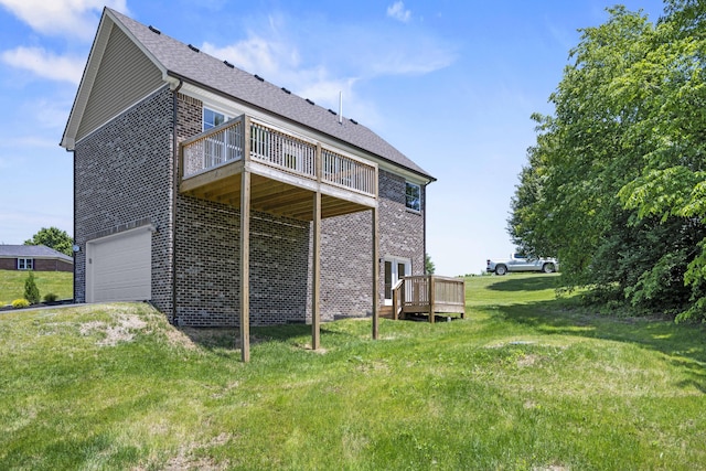 1814 Adkinson Dr, Richmond, KY 40475 - rear view of property featuring brick siding, a deck, an attached garage, and a yard