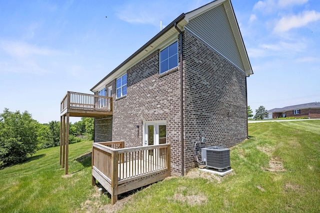 1814 Adkinson Dr, Richmond, KY 40475 - back of house featuring brick siding, a deck, a yard, and central AC