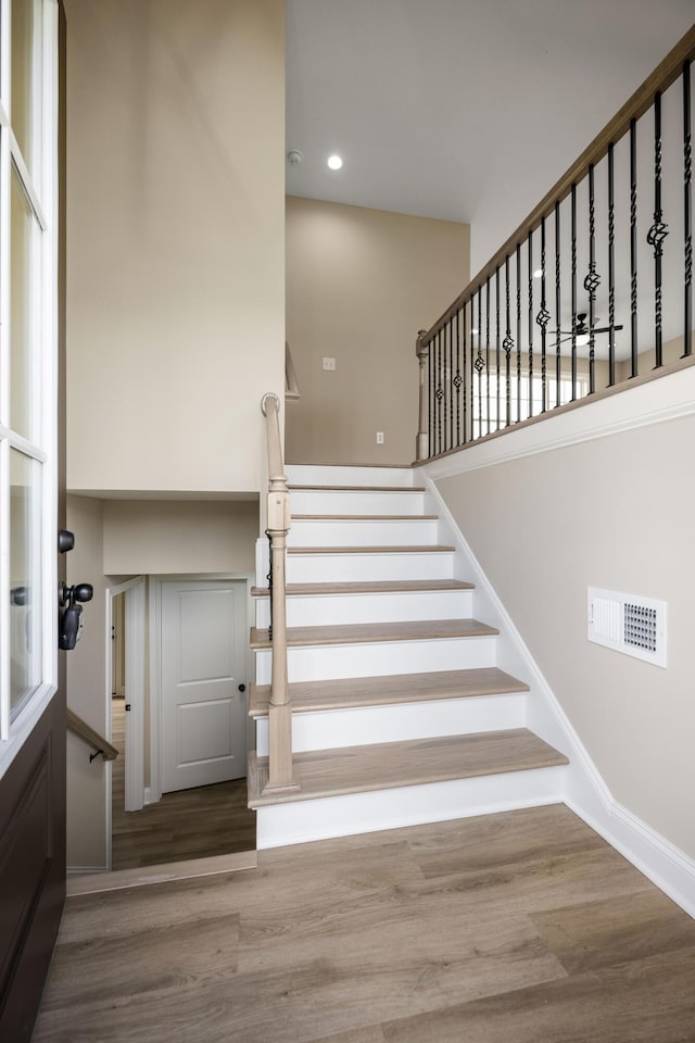 1814 Adkinson Dr, Richmond, KY 40475 - stairs with wood finished floors, recessed lighting, baseboards, and a high ceiling