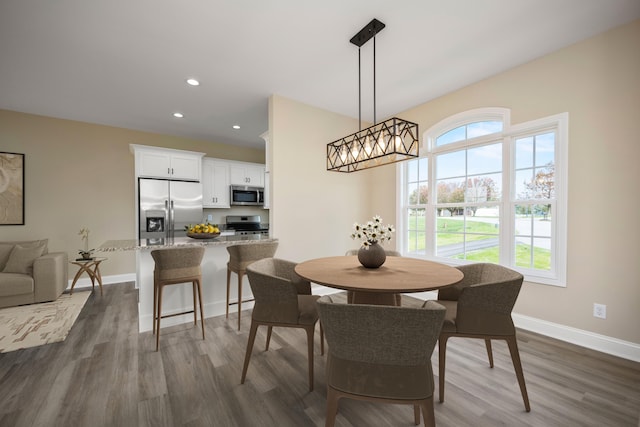 1814 Adkinson Dr, Richmond, KY 40475 - dining area featuring baseboards, dark wood-type flooring, and recessed lighting