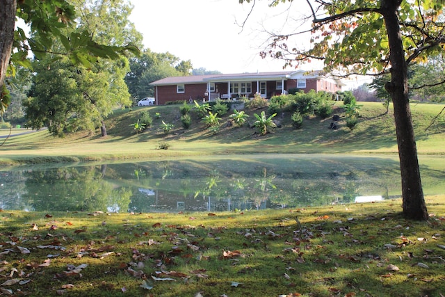 view of yard with a water view