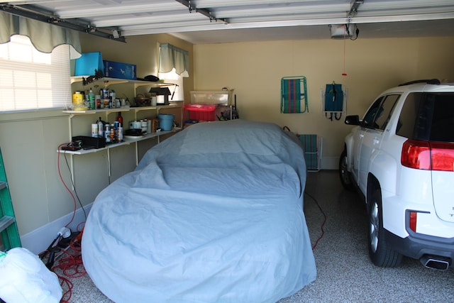 garage featuring a garage door opener