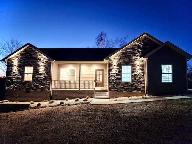 ranch-style house featuring a porch