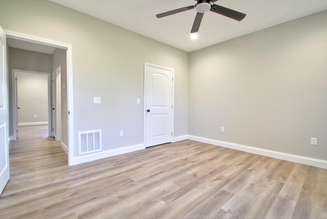 unfurnished bedroom featuring light hardwood / wood-style flooring and ceiling fan