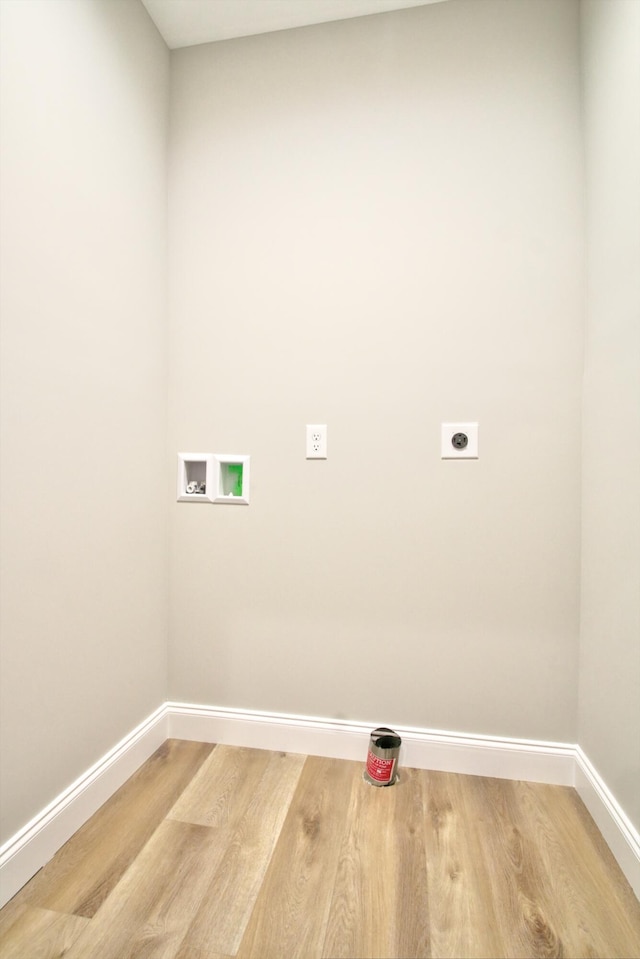 laundry room with washer hookup, hardwood / wood-style flooring, and hookup for an electric dryer