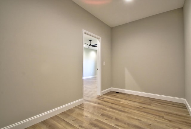 unfurnished room with light wood-type flooring